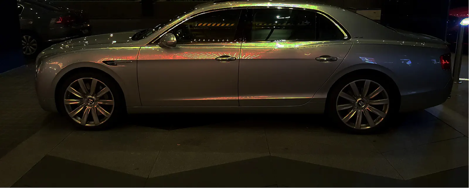 Bently Flying Spur at night time